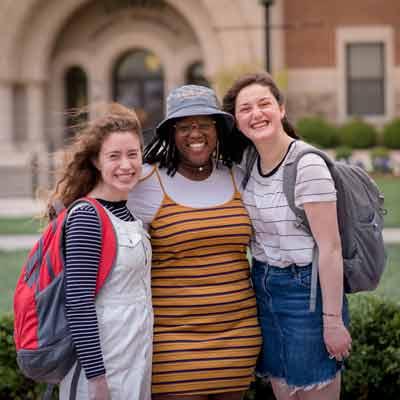 Students posing for a photo on campus